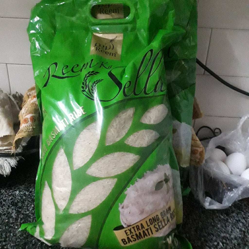 MUQADDAS RICE TRADDERS \ REEM KAINAT SELLA BASMATI RICE 5KG